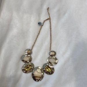 Beautiful gold and beige color necklace